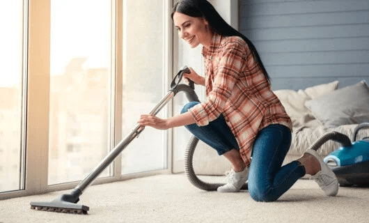 Woman cleaning her house | Jubilee Flooring & Decorating